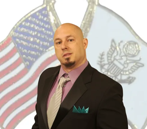TRAVIS MANDENBERG — Marketing Coordinator
